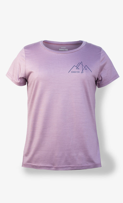 T-shirt mérinos femme mauve pâle imprimé paysage ultra léger, respirant et confortable, parfait pour le voyage et les activités de plein air comme l'escalade et la randonnée.