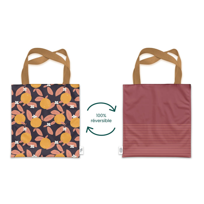 deux sacs fourre tout avec motifs oranges et rose avec les ganses beiges sur fond blanc