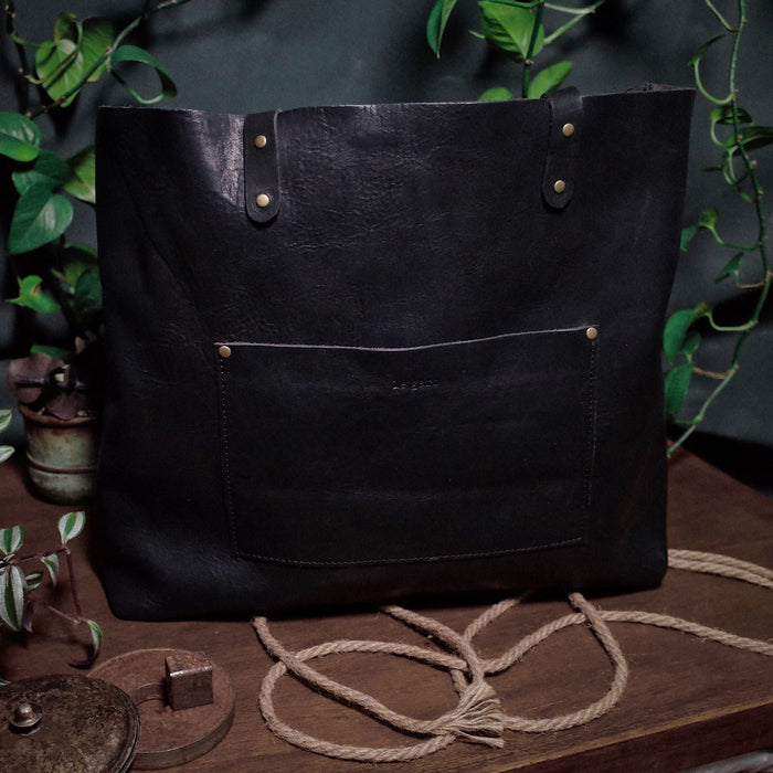 Durable handcrafted black leather handbag made in Canada
