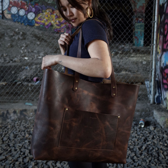 Durable handcrafted dark-brown leather handbag made in Canada
