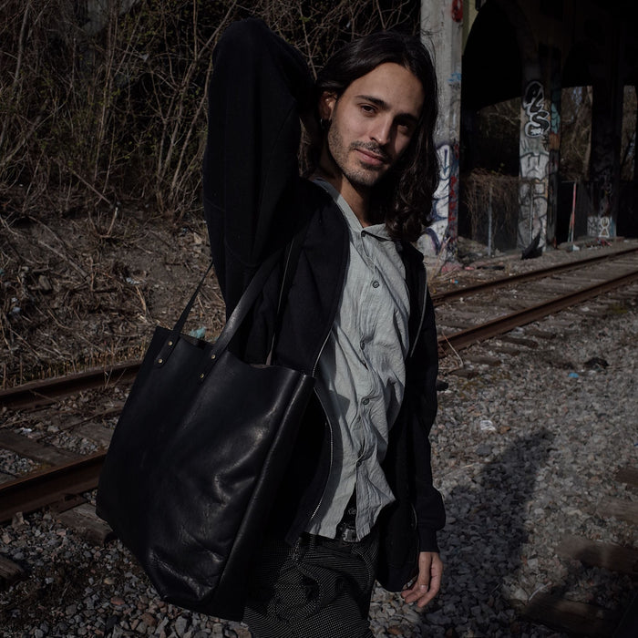 Durable handcrafted black leather tote bag made in Canada
