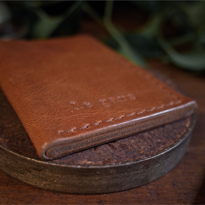 Durable handcrafted saddle tan leather cardholder made in Canada
