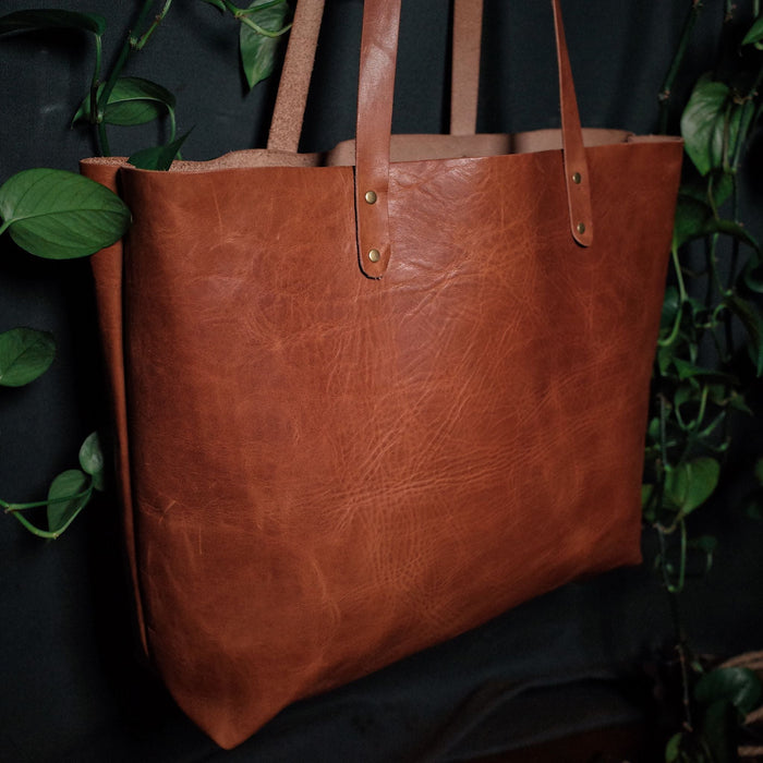 Montreal-made honey brown leather shoulder bag for eco-conscious buyers
