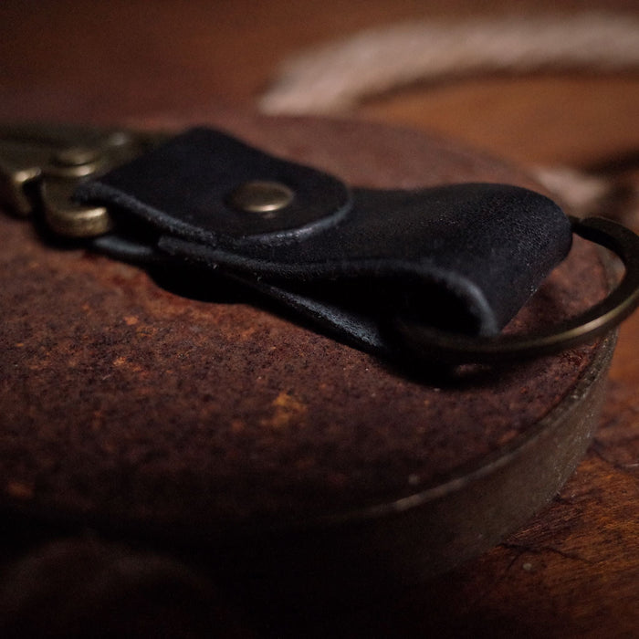 Locally crafted black leather keyring with heavy-duty carabiner
