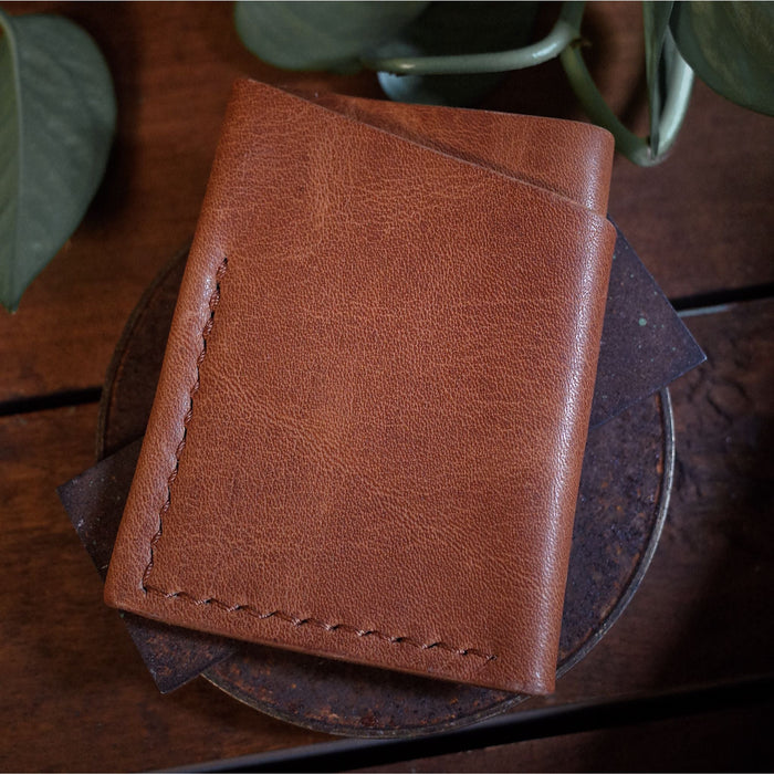 Sleek saddle tan leather cardholder for business cards and credit cards
