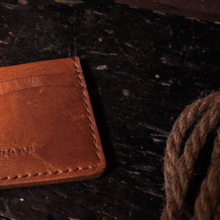 Rustic light-brown leather wallet handcrafted by artisans