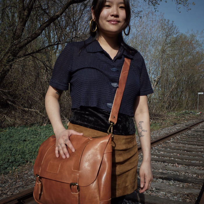 Timeless caramel leather bag made by Montreal artisans
