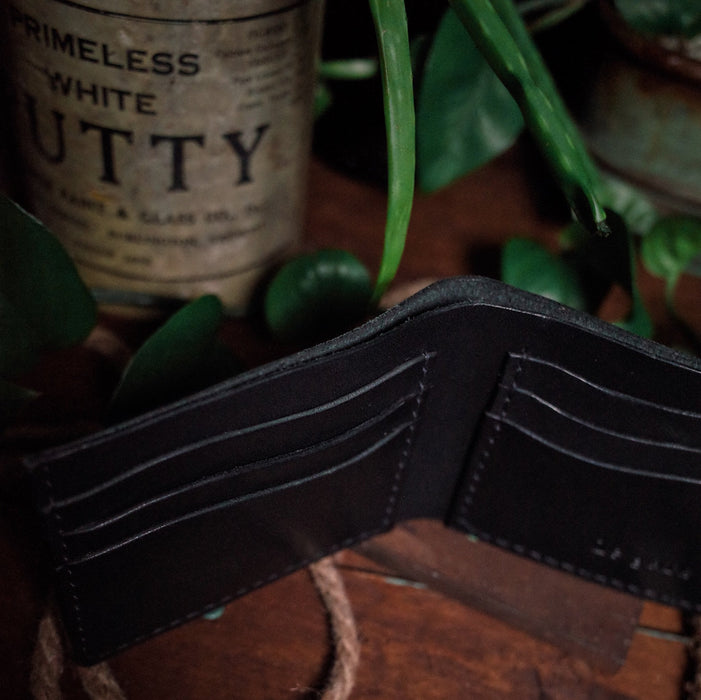 High-quality black leather bifold wallet with timeless appeal
