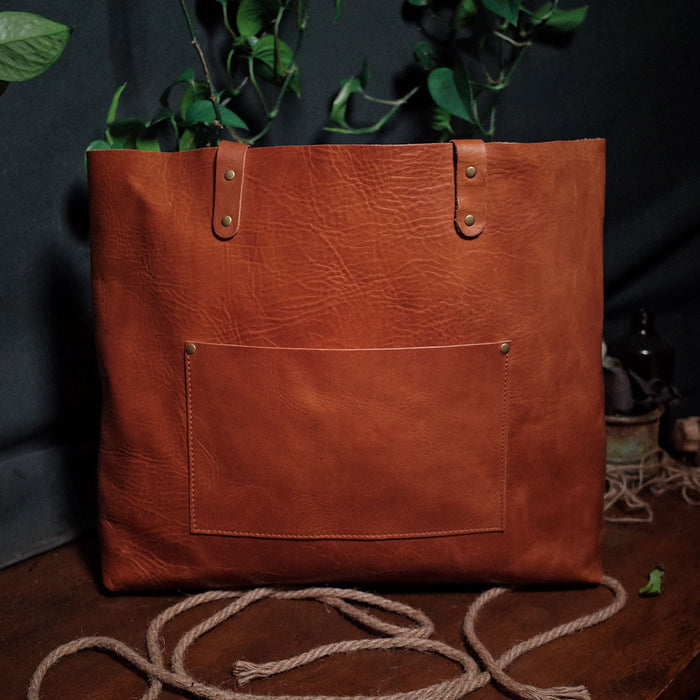 Customizable honey brown leather shopper with durable hand-stitching

