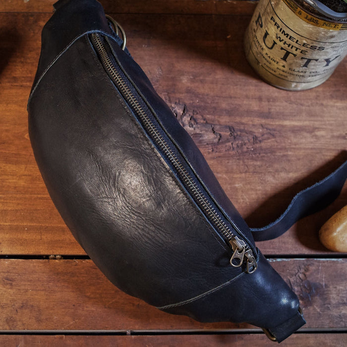 Large black leather moon bag with strong zipper
