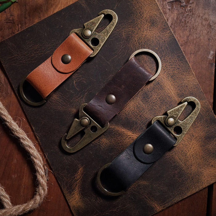 Elegant black leather key fob with premium hardware for modern style
