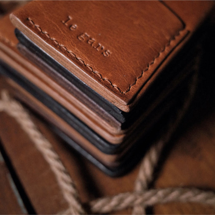 Slim saddle tan leather cardholder designed for professionals
