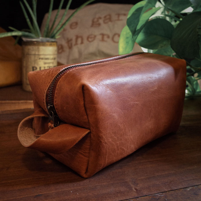 Montreal-made English tan leather travel bag for grooming essentials
