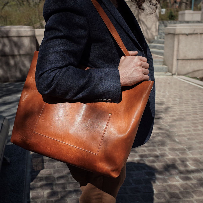 Hand-stitched caramel leather carryall for daily use
