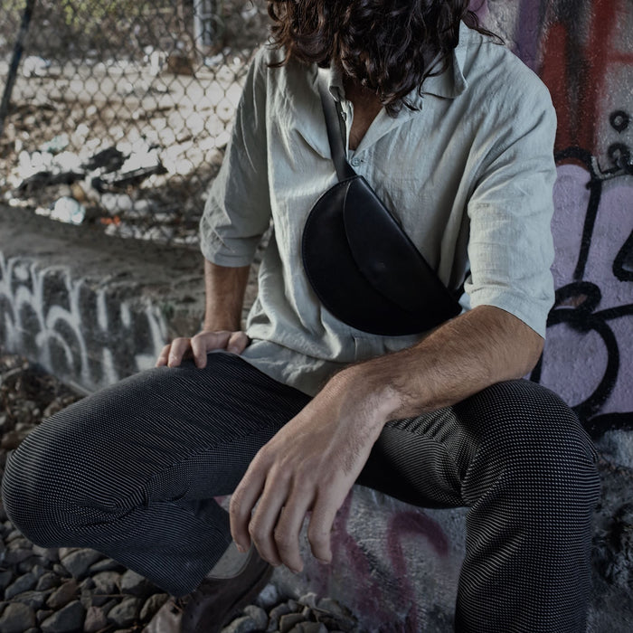 Montreal-made black leather fanny pack for light carry essentials
