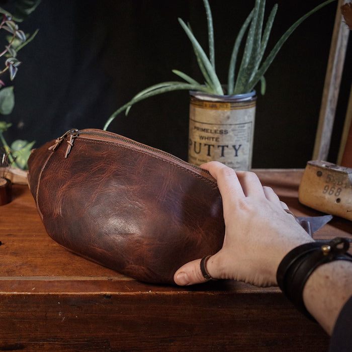 Oversized mocha leather belt bag for stylish, everyday carry
