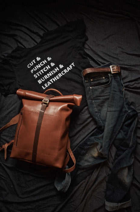 Stylish light-brown roll-top leather backpack with durable G-hook
