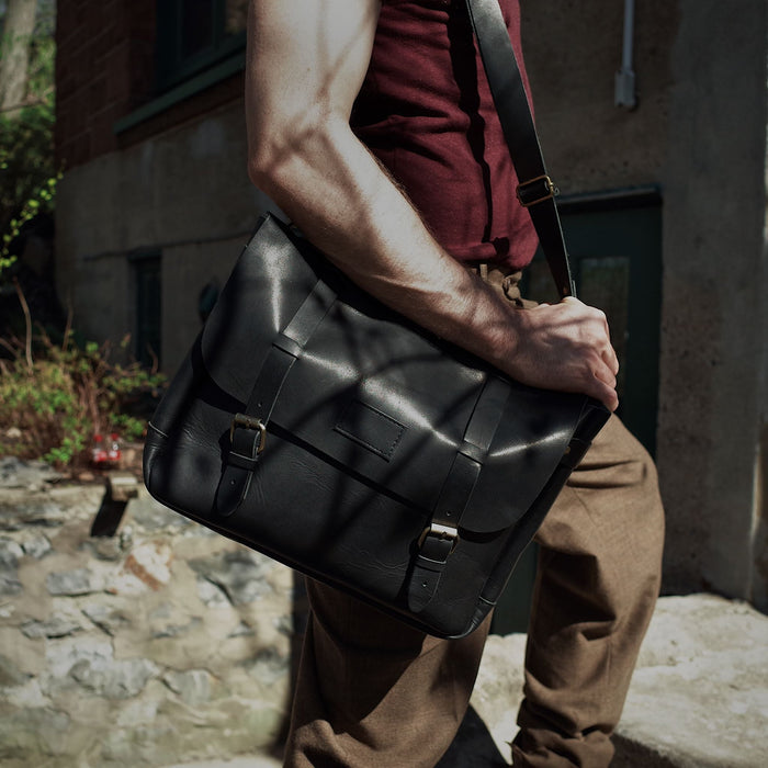 Champlain leather carryall in black with premium detailing
