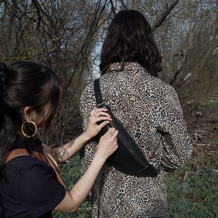 Handcrafted black leather fanny pack with oversized compartments
