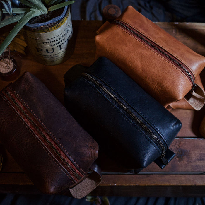 Montreal-made black leather accessory pouch with sleek, minimalist design
