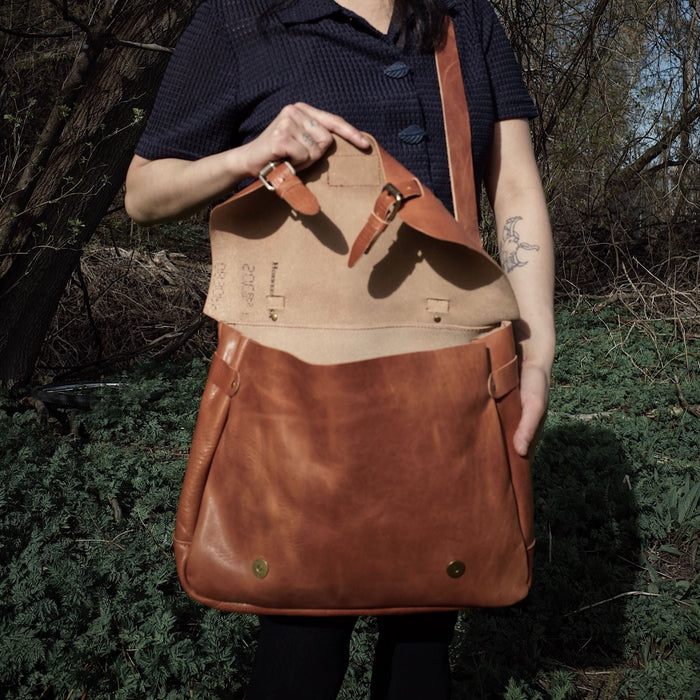 Champlain leather tote in caramel with premium detailing
