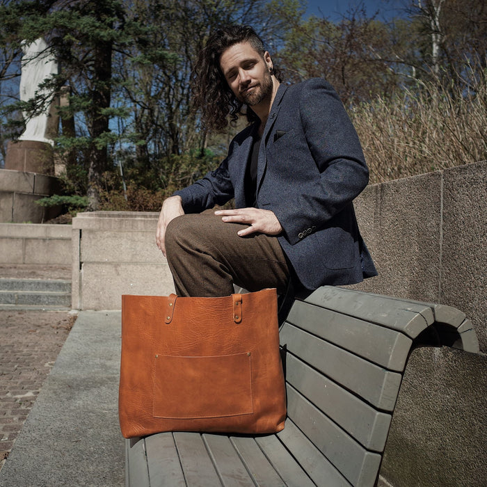 Full-grain caramel leather shoulder bag for work and travel
