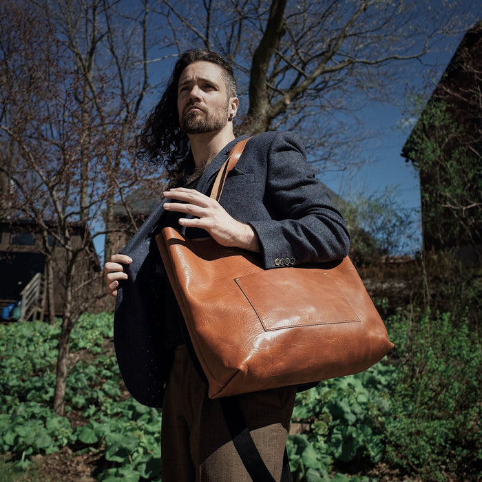 Durable full-grain cognac leather handbag perfect for travel
