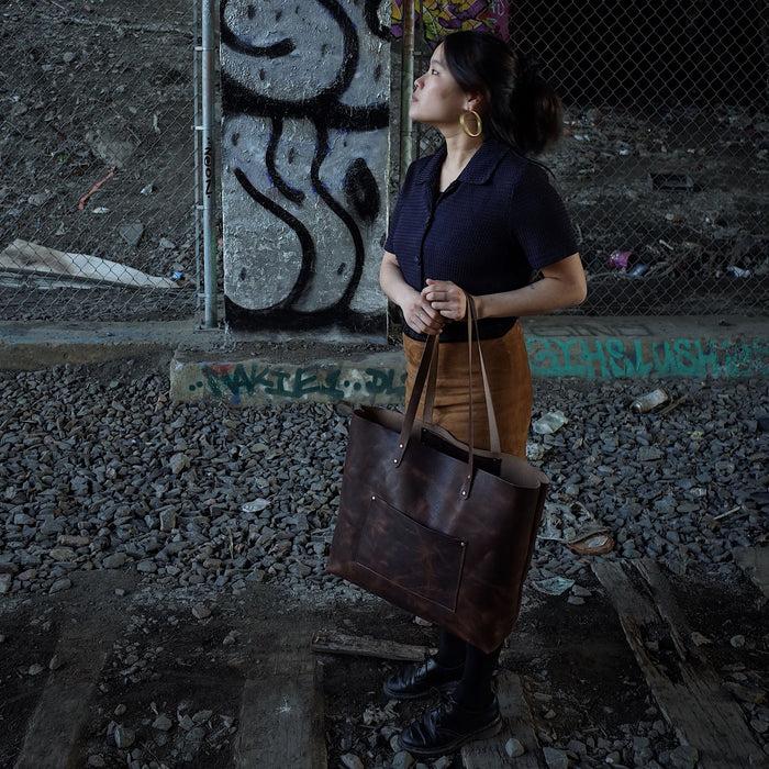Durable full-grain mocha leather handbag perfect for travel
