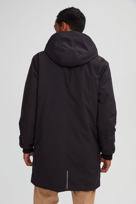 Manteau d'hiver sportif pour homme. Bande réfléchissante et ajustements.