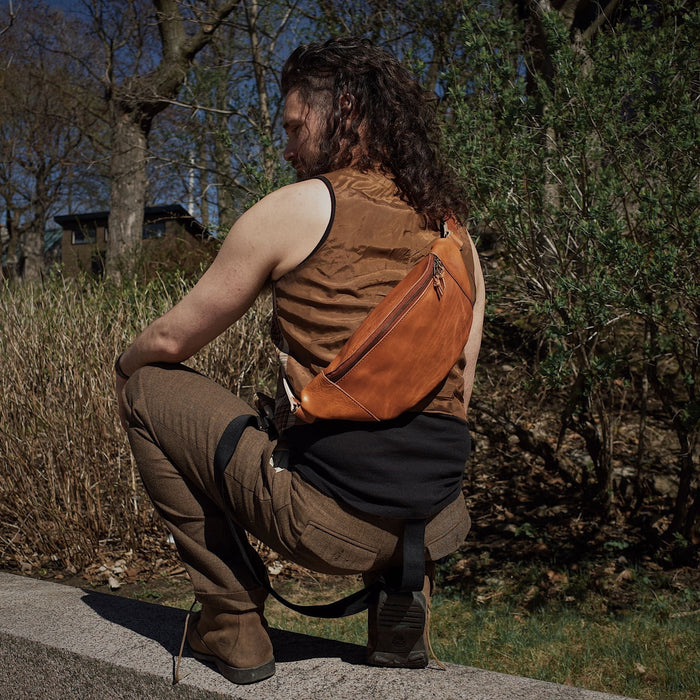 Roomy honey brown leather fanny pack for oversized essentials
