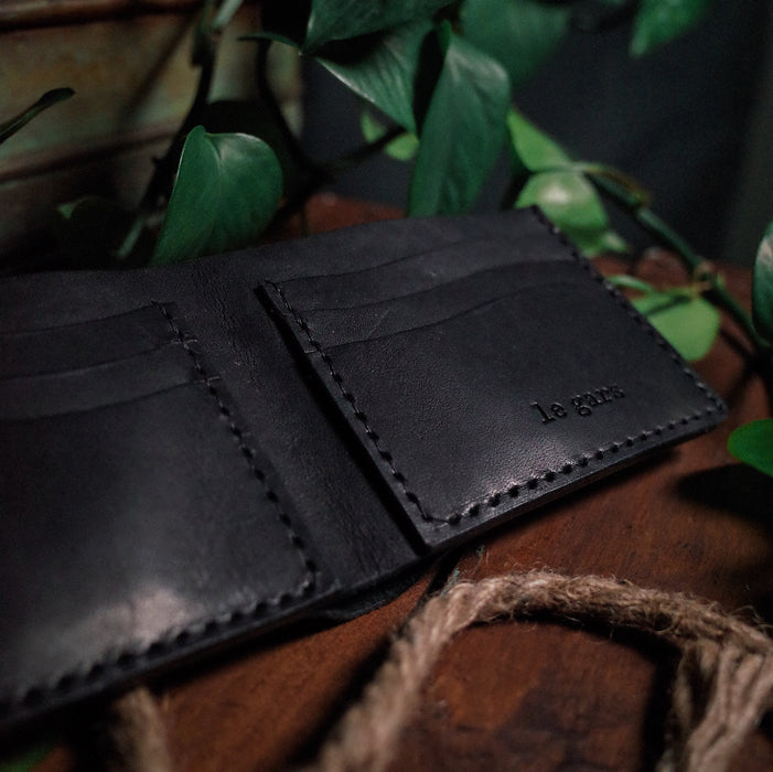 Premium black leather wallet with elegant, timeless design

