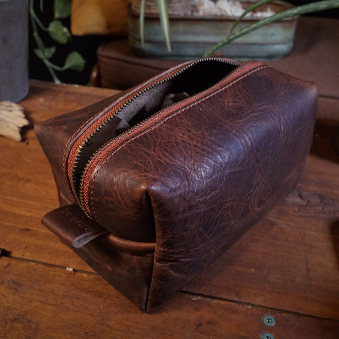 Handmade chocolate leather accessory pouch with sleek design
