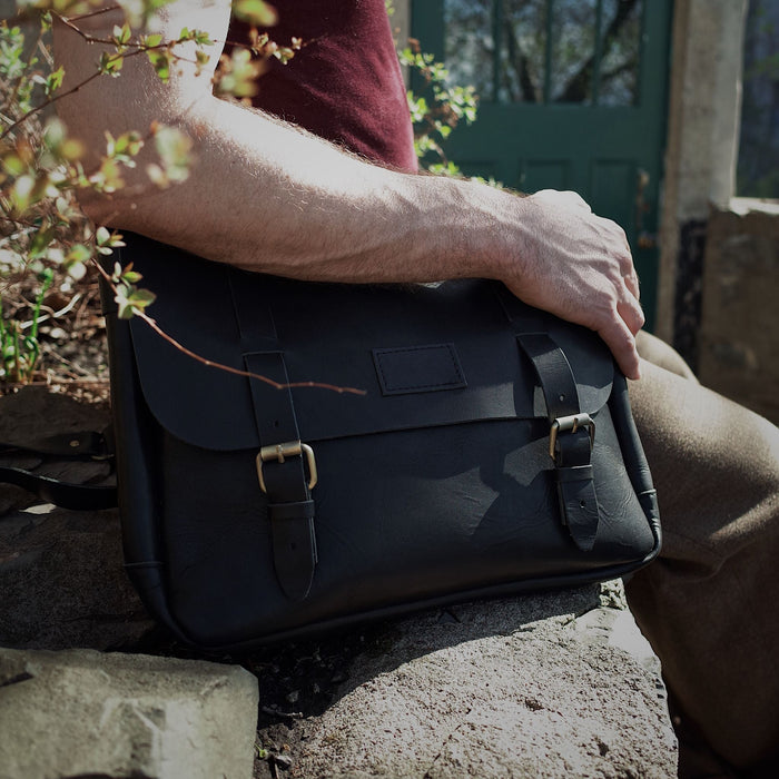 Sleek black leather tote designed for everyday use
