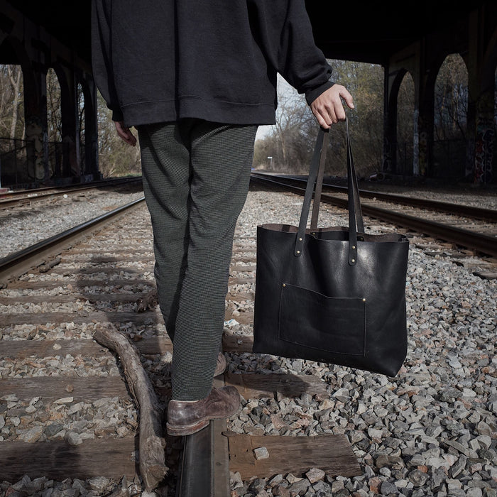 Genuine black leather shopper designed for style and function
