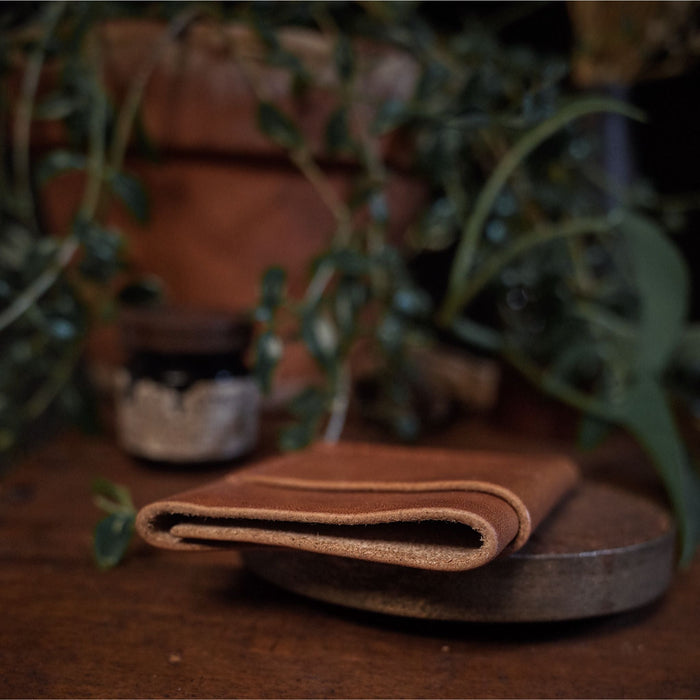 Genuine English tan leather cardholder designed for style and function
