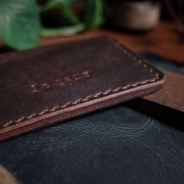 Genuine dark-brown leather wallet designed for style and function
