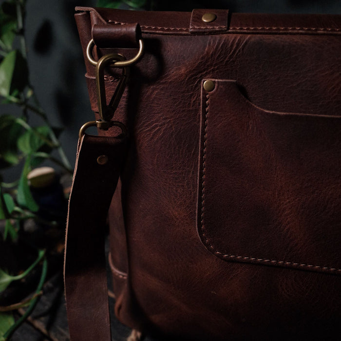 Genuine dark-brown leather shoulder bag designed for style and function
