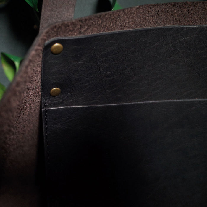 Luxury handcrafted black leather tote for professionals
