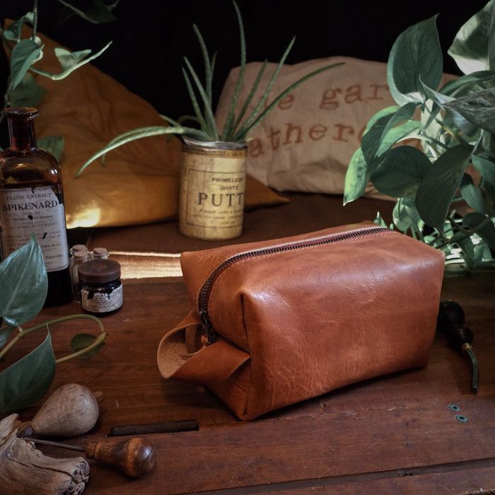 Premium English tan leather dopp kit for weekend getaways
