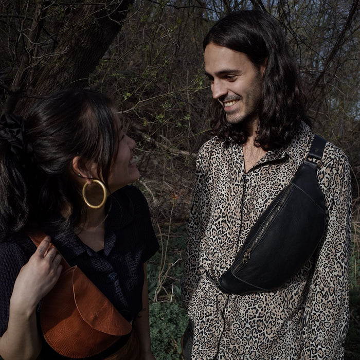 Spacious black leather moon bag perfect for large essentials
