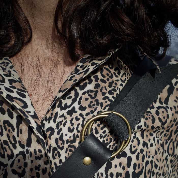 Large black leather fanny pack with heavy-duty zipper
