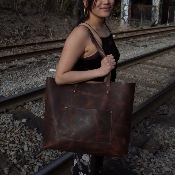Durable handcrafted chestnut leather handbag made from Horween leather
