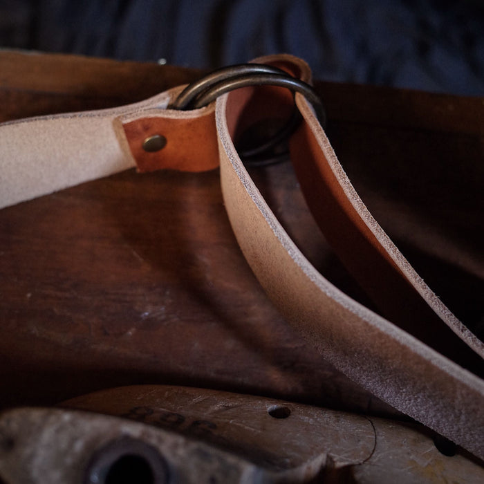 Small saddle tan leather moon bag perfect for lightweight carry
