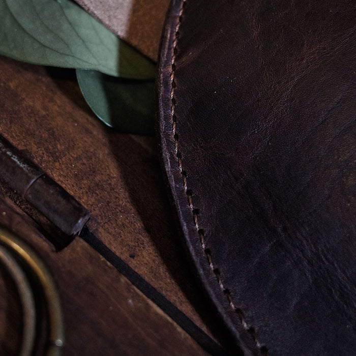 Artisanal chocolate leather fanny pack for small essentials
