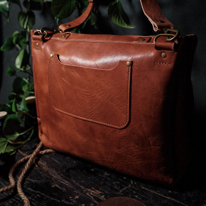 Handmade light brown leather briefcase with minimalist appeal
