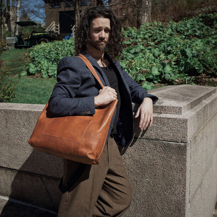 Versatile caramel leather tote for men and women

