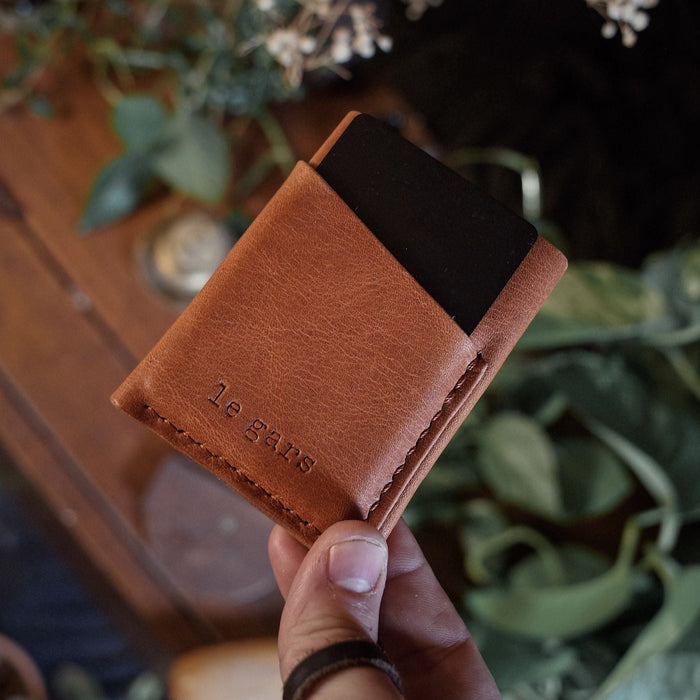 Compact caramel leather cardholder designed for durability and functionality
