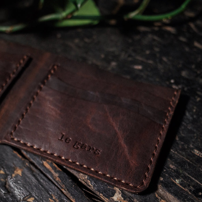Full-grain chestnut leather bifold wallet for minimalist fashion
