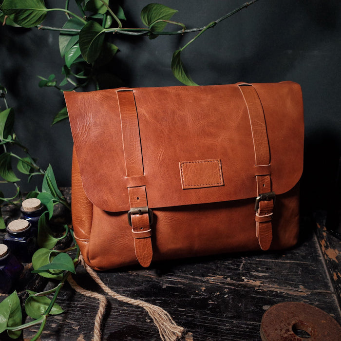 Durable honey brown leather tote made for style and function
