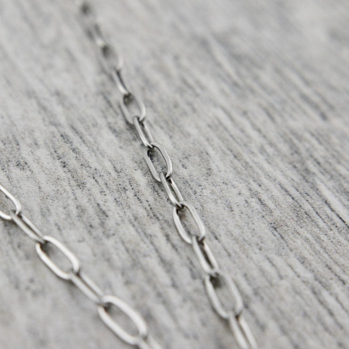 Collier pleine lune en acier et perle